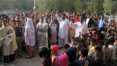 Patients wait for the clinic to open.