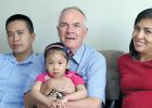 Charito, Fr. John holding Camile and Marisol in Peru